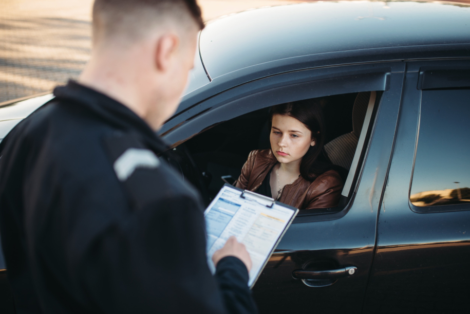 woman getting a police ticket