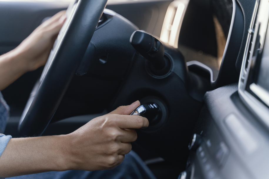 woman-starting-engine-her-car