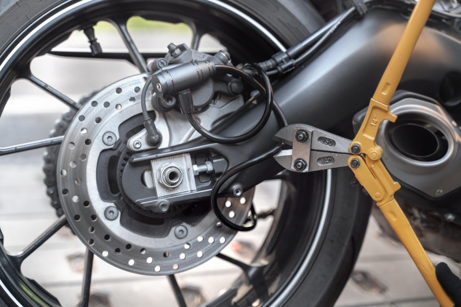 close-up-man-preparing-steal-motorcycle